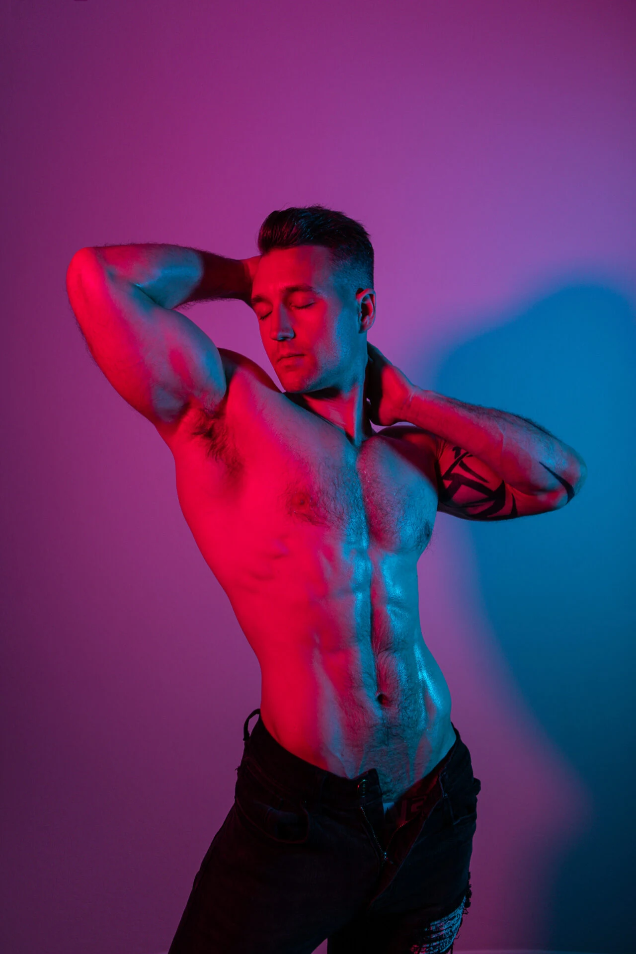 Editorial men's portrait, colored gel lighting